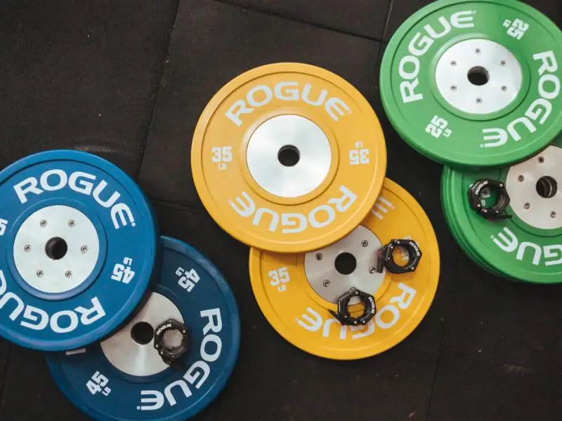 Stacks of coloured bumper plates
